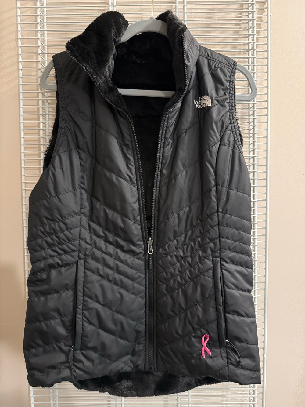 The North Face Women’s Reversible Puffer/Fleece Vest